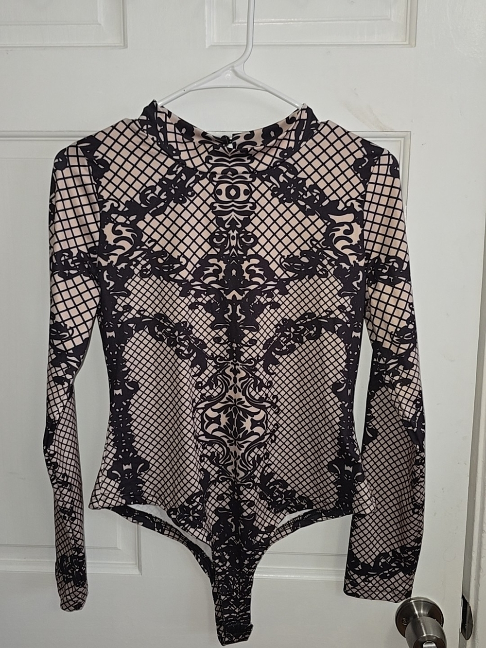 Long-Sleeve Pink and Black Patterned Bodysuit